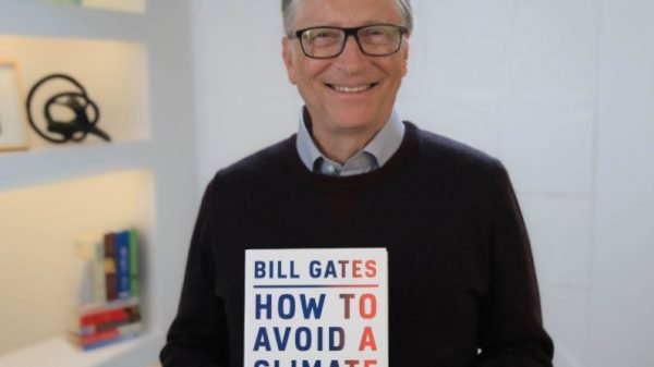 Bill Gates with his book
