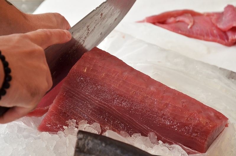 A section of bluefin Tuna being prepared