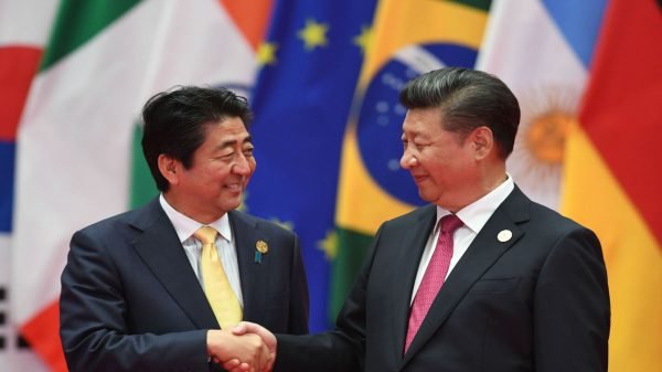 Shinzo Abe and Xi Jinping Photo Credit: Reuters