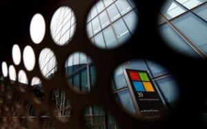 A view shows a Microsoft logo at Microsoft offices in Issy-les-Moulineaux near Paris, France, January 25, 2023. REUTERS/Gonzalo Fuentes/File Photo