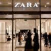 Shoppers walk past a Zara clothes store, part of the Spanish group Inditex, in Las Palmas de Gran Canaria, Spain, December 13, 2022. REUTERS/Borja Suarez