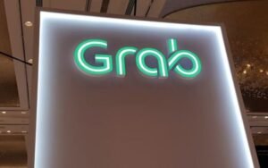 A Grab logo is pictured at the Money 20/20 Asia Fintech Trade Show in Singapore March 21, 2019. REUTERS/Anshuman Daga/FILE PHOTO