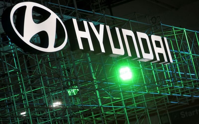 Hyundai logo is seen during Munich Auto Show, IAA Mobility 2021 in Munich, Germany, September 8, 2021. REUTERS/Wolfgang Rattay/File Photo