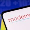 Moderna logo and stock graph are seen displayed in this illustration taken, May 3, 2022. REUTERS/Dado Ruvic/Illustration/File photo