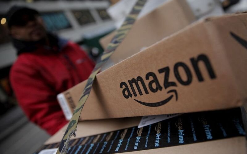 Amazon boxes are seen stacked for delivery in the Manhattan borough of New York City, January 29, 2016. REUTERS/Mike Segar/File Photo