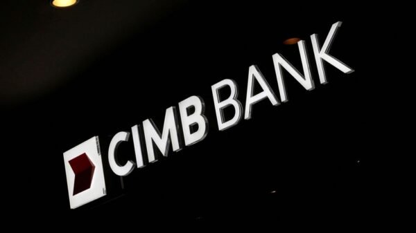 A logo of Malaysia's CIMB Bank is on display outside its branch in Kuala Lumpur February 7, 2013. REUTERS/Bazuki Muhammad/File Photo
