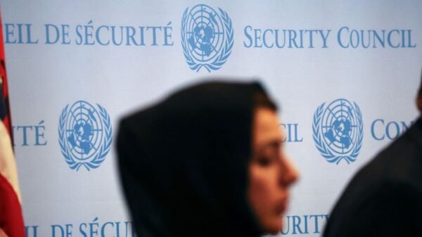 A woman stands during a press conference following the meeting of the Security Council on the conflict between Israel and the Palestinian Islamist group Hamas at U.N. headquarters in New York, U.S., October 24, 2023. REUTERS/Shannon Stapleton