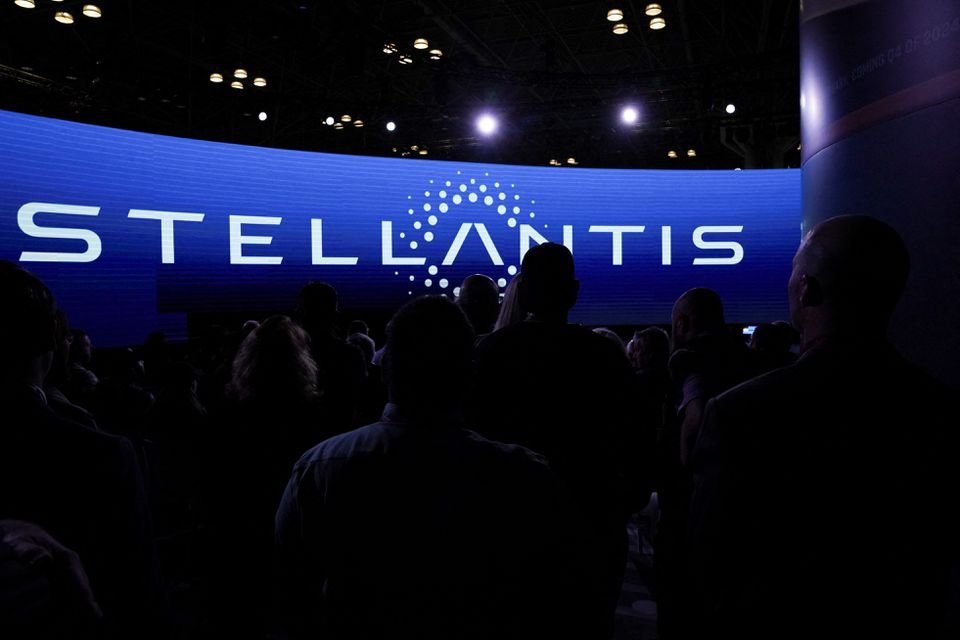 People attend a Stellantis presentation at the New York International Auto Show, in Manhattan, New York City, U.S., April 5, 2023. REUTERS/David 'Dee' Delgado/File Photo