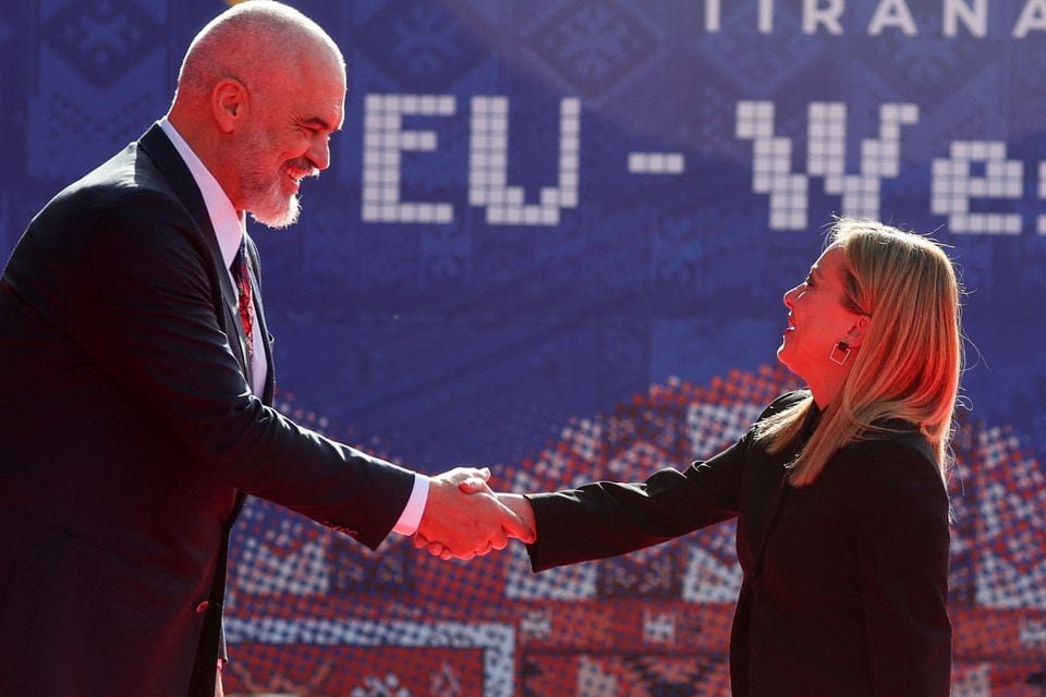 Albania's Prime Minister Edi Rama welcomes Italy's Prime Minister Giorgia Meloni before the EU-Western Balkans summit in Tirana, Albania, December 6, 2022. REUTERS/Florion Goga/File Photo