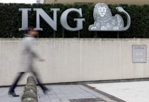 A pedestrian walks past the logo of ING bank by the group's main office in Brussels, Belgium, October 3, 2016. REUTERS/Francois Lenoir/File Photo
