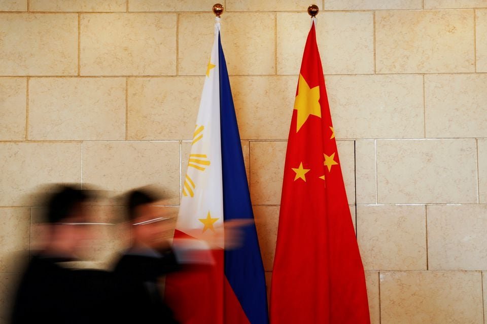 National flags are placed outside a room where Philippine Finance Secretary Carlos Dominguez and China's Commerce Minister Gao Hucheng address reporters after their meeting in Beijing, China, January 23, 2017. REUTERS/Damir Sagolj/File Photo