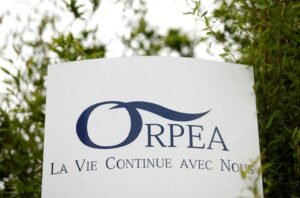 A view shows the logo of French care homes company Orpea at the entrance of a retirement home (EHPAD - Housing Establishment for Dependant Elderly People) in Reze near Nantes, France, February 2, 2022. REUTERS/Stephane Mahe/File Photo
