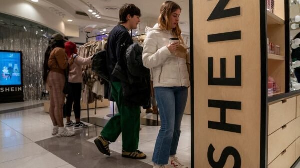 People shop at the Shein Holiday pop-up shop inside of Times Square's Forever 21 in New York City, U.S., November 10, 2023.REUTERS/David 'Dee' Delgado/File Photo