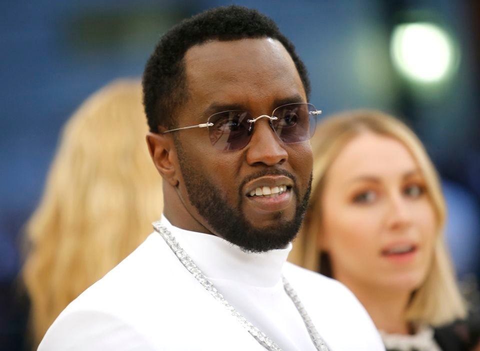 Sean Combs arrives at the Metropolitan Museum of Art Costume Institute Gala (Met Gala) to celebrate the opening of “Heavenly Bodies: Fashion and the Catholic Imagination” in the Manhattan borough of New York, U.S., May 7, 2018. REUTERS/Eduardo Munoz/File Photo