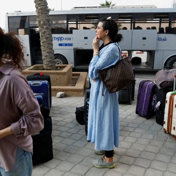 Suzan Beseiso, a Palestinian holding a U.S. passport, waits for permission to leave Gaza, amid the ongoing conflict between Israel and Palestinian Islamist group Hamas, at the Rafah border crossing with Egypt, in Rafah in the southern Gaza Strip, November 2, 2023. REUTERS/Ibraheem Abu Mustafa/File Photo