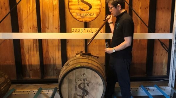 Taiko Nakamura samples whisky barreled in the year he founded at his distillery in Shizuoka, Shizuoka Prefecture, Japan October 25, 2023. REUTERS/Rocky Swift/File Photo