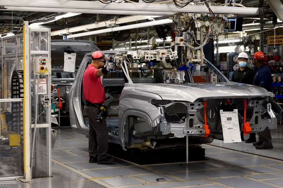 A worker assembles parts of a Tundra Truck at Toyota's truck plant in San Antonio, Texas, U.S. April 17, 2023. REUTERS/Jordan Vonderhaar/File Photo