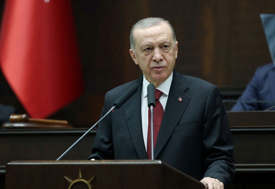 Turkey's President Tayyip Erdogan addresses lawmakers from his ruling AK Party at the Turkish Parliament in Ankara, Turkey October 11, 2023. Presidential Press Office/Handout via REUTERS/File Photo