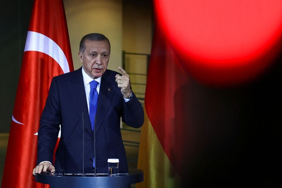 Turkish President Tayyip Erdogan gestures as he attends a press conference with German Chancellor Olaf Scholz (not pictured) at the Chancellery in Berlin, Germany, November 17, 2023. REUTERS/Liesa Johannssen/File Photo