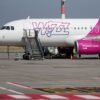 Wizz Air's aircraft is parked on the tarmac at Ferenc Liszt International Airport in Budapest, Hungary, August 18, 2022. REUTERS/Bernadett Szabo/File Photo