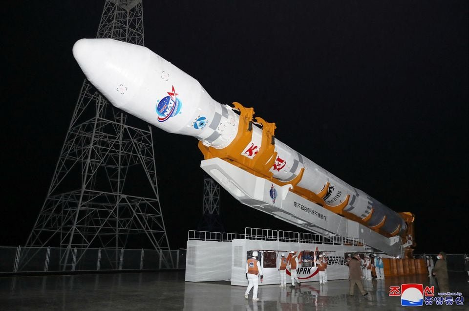 A rocket carrying a spy satellite Malligyong-1 is prepared to be launched, as North Korean government claims, in a location given as North Gyeongsang Province, North Korea in this handout picture obtained by Reuters on November 21, 2023. KCNA via REUTERS