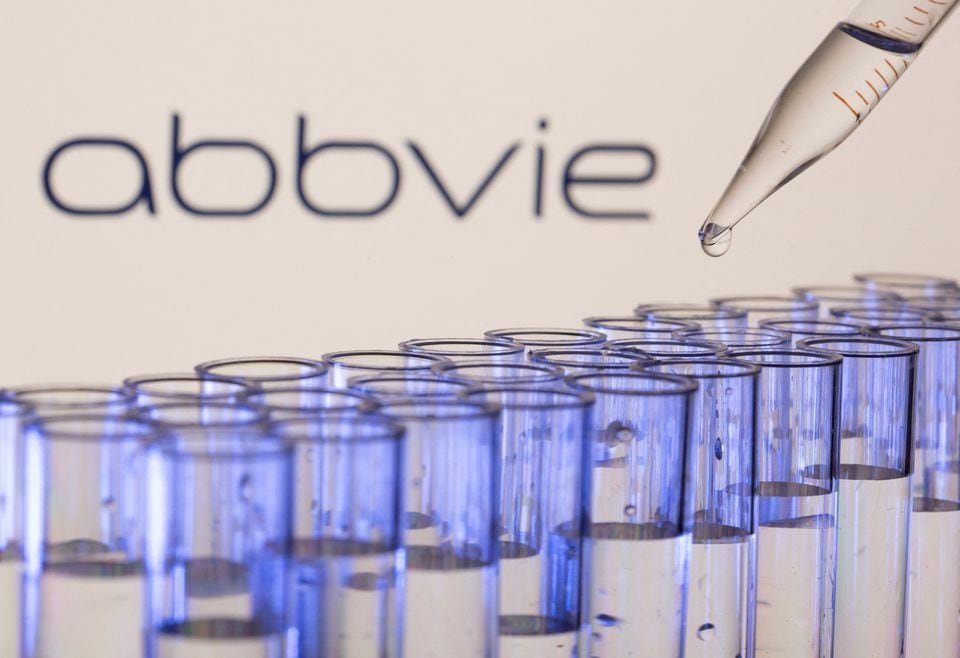 Test tubes are seen in front of a displayed Abbvie logo in this illustration taken, May 21, 2021. REUTERS/Dado Ruvic/Illustration/File Photo