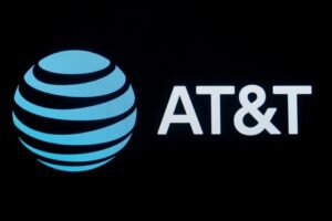 File photo: The company logo for AT&T is displayed on a screen on the floor at the New York Stock Exchange (NYSE) in New York, U.S., September 18, 2019. REUTERS/Brendan McDermid/File photo