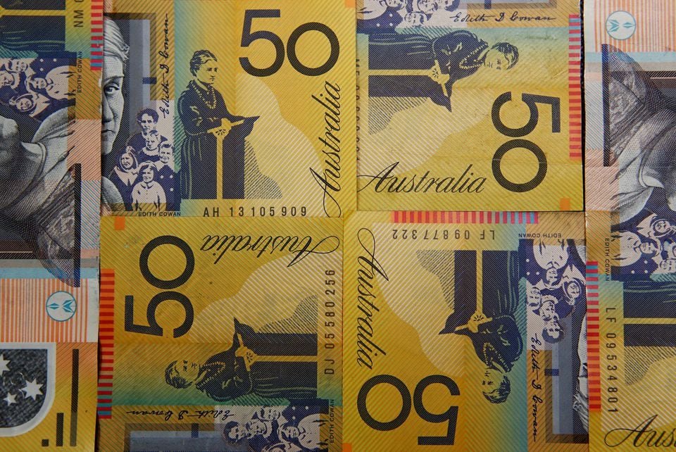 Australian dollars are seen in an illustration photo February 8, 2018. REUTERS/Daniel Munoz