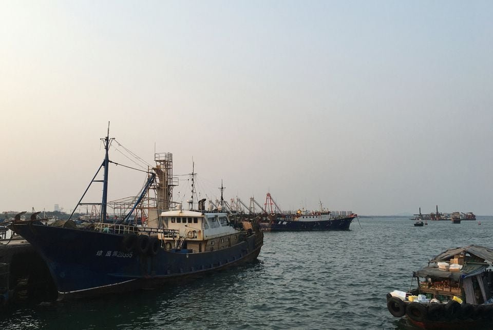 Fishing boats are seen at a harbour in Baimajing, Hainan province, April 7, 2016. To match Feature SOUTHCHINASEA-CHINA/FISHINGBOATS REUTERS/Megha Rajagopalan/File Photo