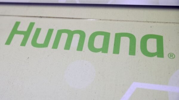 Signage for Humana Inc. is pictured at a health facility in Queens, New York City, U.S., November 30, 2021. REUTERS/Andrew Kelly/File Photo