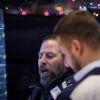 Traders work on the floor at the New York Stock Exchange (NYSE) in New York City, U.S., December 11, 2023. REUTERS/Brendan McDermid