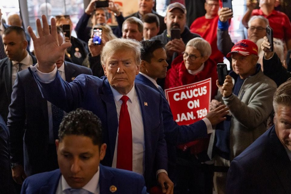 Former U.S. President and Republican presidential candidate Donald Trump rallies with supporters at a "commit to caucus" event at a Whiskey bar in Ankeny, Iowa, U.S. December 2, 2023. REUTERS/Carlos Barria/File photo