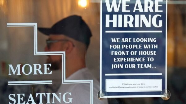 A restaurant advertises for workers in Brighton, Britain, Aug. 15, 2023. REUTERS/Toby Melville/File Photo