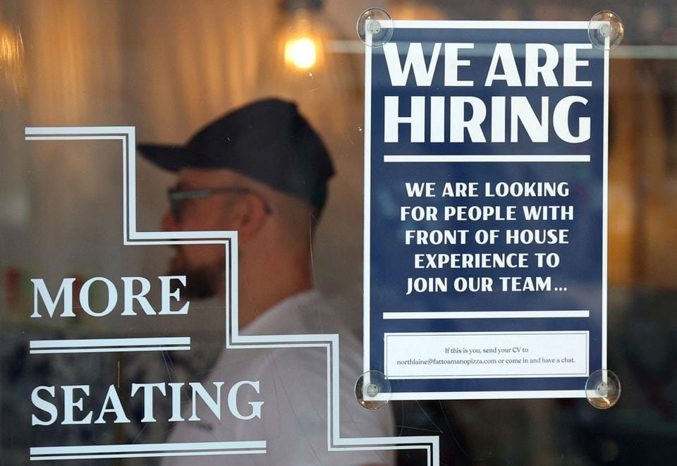 A restaurant advertises for workers in Brighton, Britain, Aug. 15, 2023. REUTERS/Toby Melville/File Photo