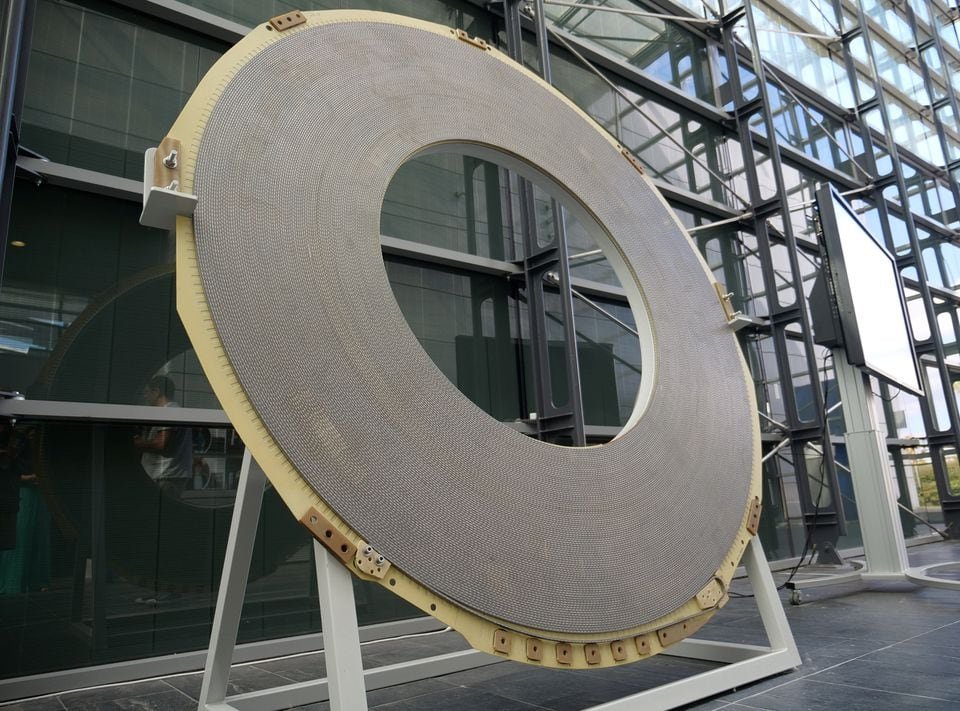 A view shows one of the superconductor coils which are assembled to form the giant magnet within which the magnectic field is 11.7 T., the core component of the most powerful MRI (Magnetic Resonance Imaging) scanner in the world to be used for human brain imaging at the Neurospin facility of the CEA Saclay Nuclear Research Centre near Paris, France, September 17, 2019. Picture taken September 17, 2019. REUTERS/Thierry Chiarello/File Photo