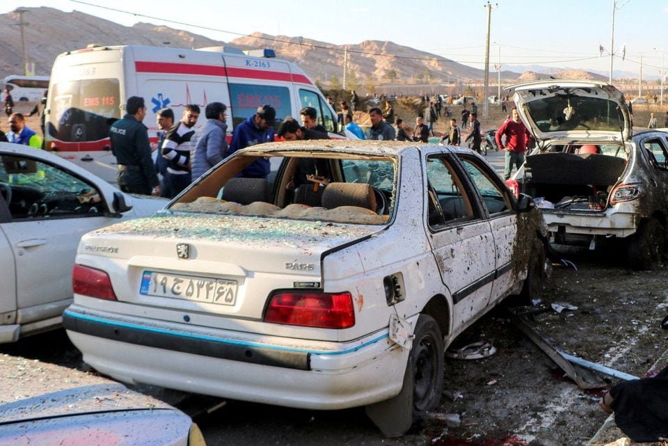 People gather at the scene of explosions during a ceremony held to mark the death of late Iranian General Qassem Soleimani, in Kerman, Iran, January 3, 2024. Majid Asgaripour/WANA (West Asia News Agency) via REUTERS