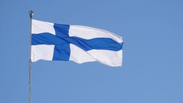 The Finnish flag flutters outside the city hall, as Finland becomes a member of NATO, in Helsinki, Finland, April 4, 2023. REUTERS/Tom Little/File Photo